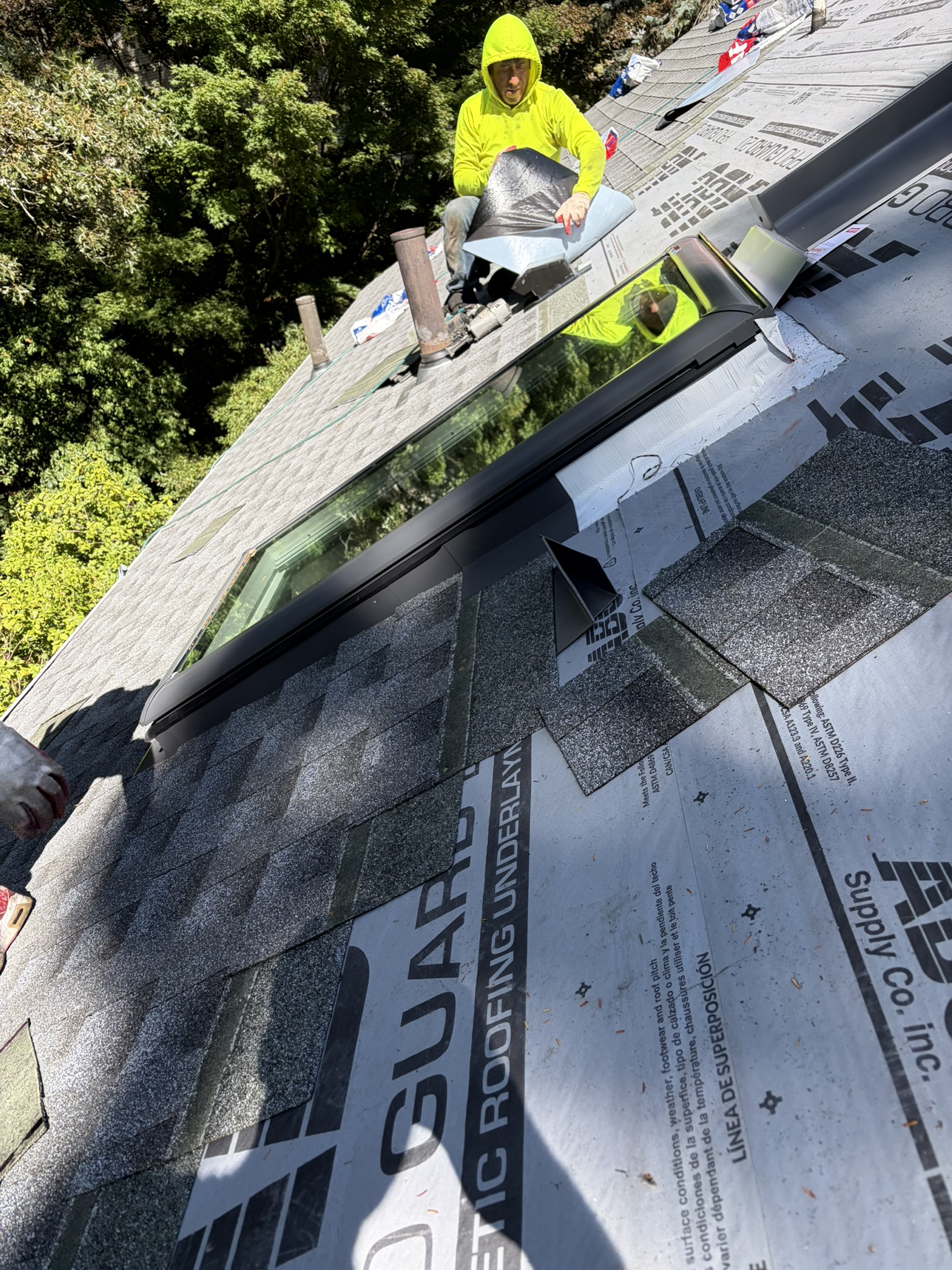 Skylight installation by Red Sky Construction roofing crew, Greater Boston MA